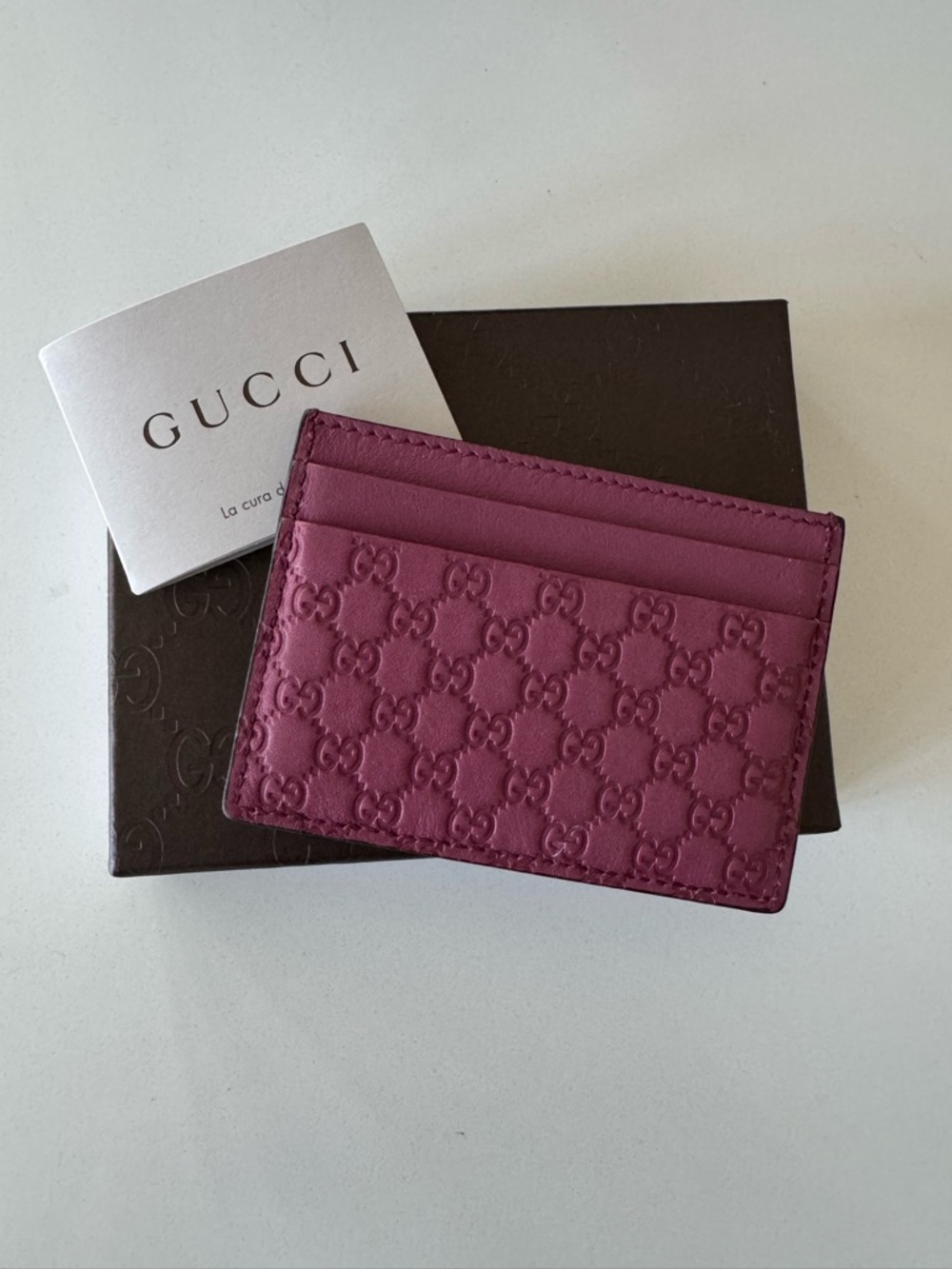 Gucci Microguccissima Embossed GG Leather Card Holder in plum color